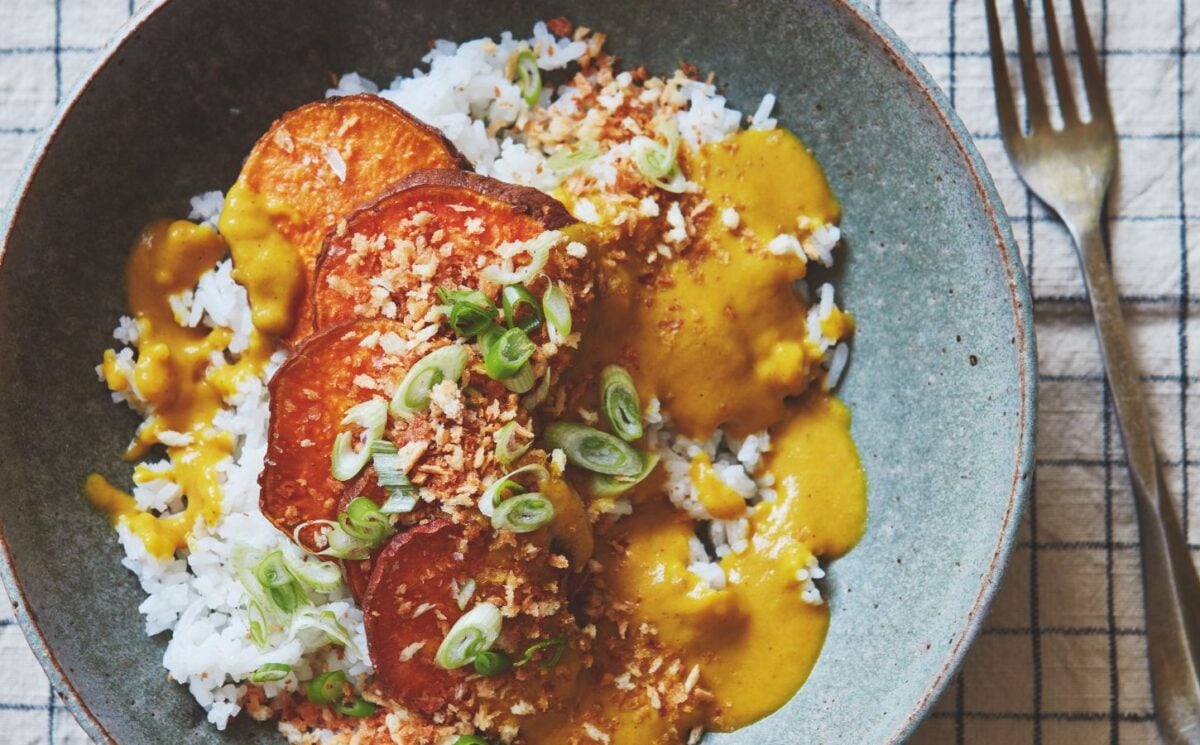 A plate of sweet potato katsu curry served with rice