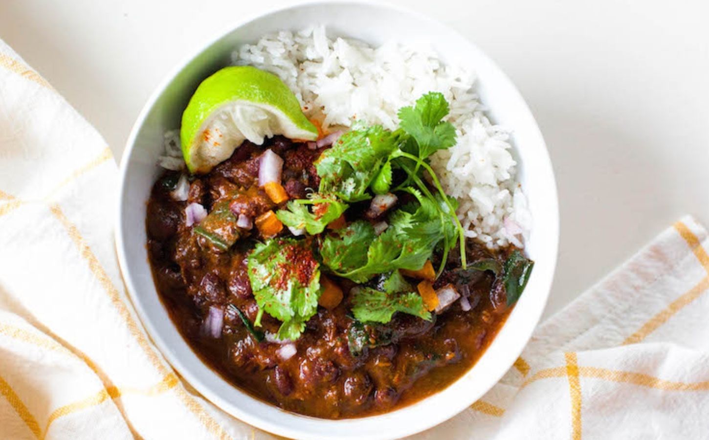 A coconut black bean stew made to a plant-based recipe