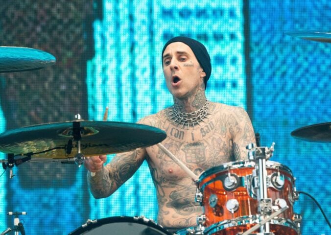 Travis Barker playing drums