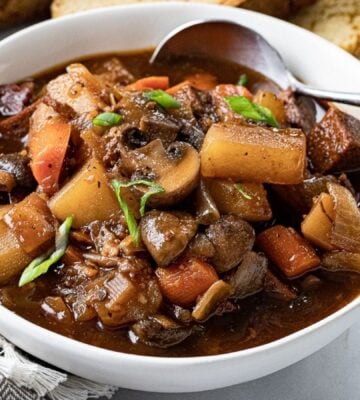 A bowl of vegan beef stew made with plant-based ingredients