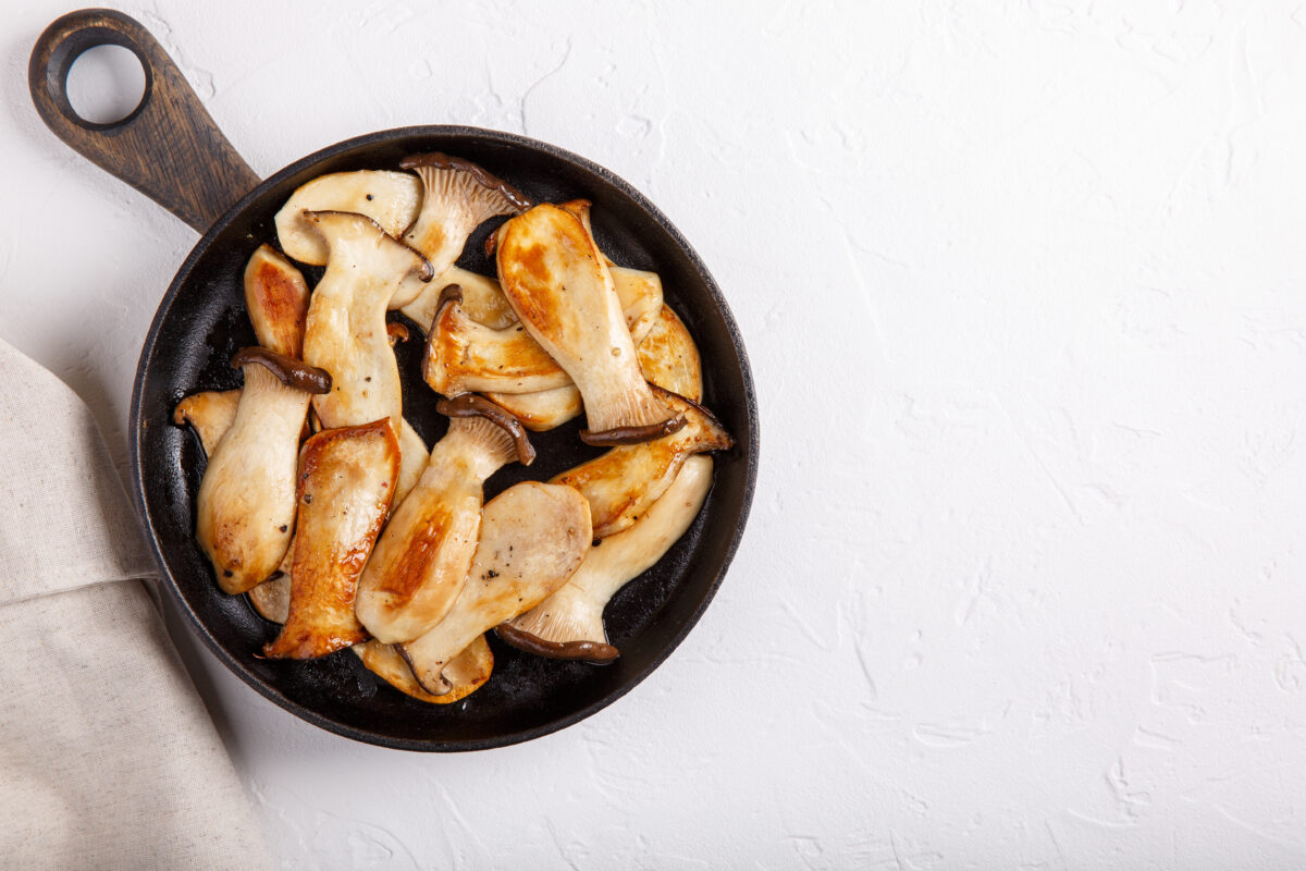 A saucepan full of King Oyster mushrooms