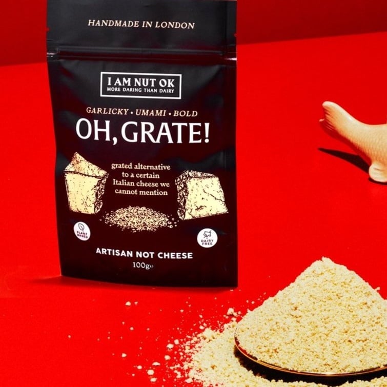 Photo shows a packet of I Am Nut OK's "Oh, Grate!" parmesan-style vegan cheese