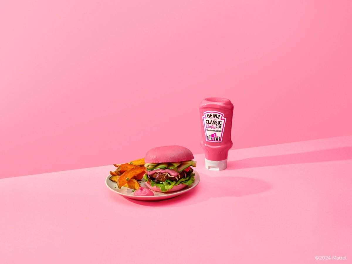 A bottle of new vegan Barbie mayo from Heinz next to a vegan burger