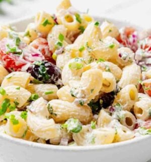 vegan summer macaroni pasta salad made with gluten-free pasta, classic flavors like tomato, parsley, olives, and vegan mayo or sour cream