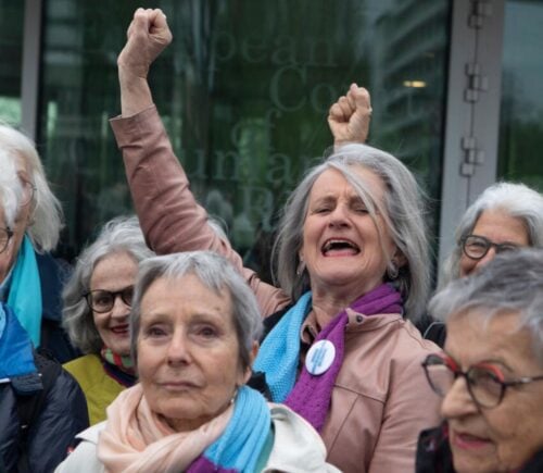 Photo shows the women of KlimaSeniorinnen celebrating their victory at the ECHR