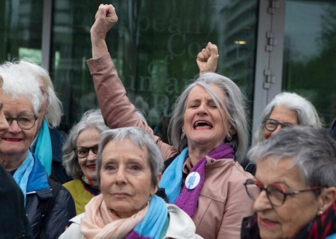 Photo shows the women of KlimaSeniorinnen celebrating their victory at the ECHR