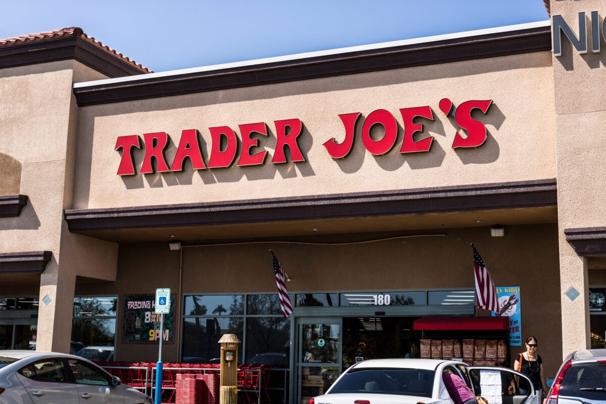 Photo shows the storefront of a Trader Joe's supermarket