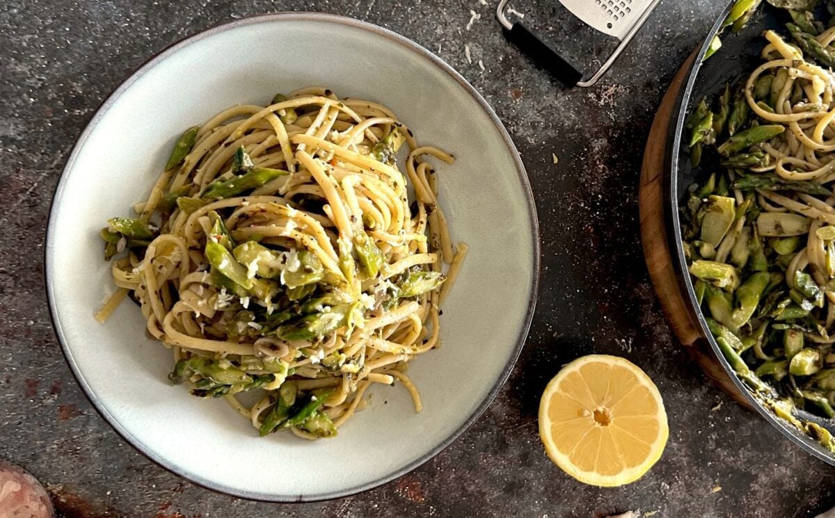A bowl of plant-based and dairy-free vegan asparagus and pesto linguine