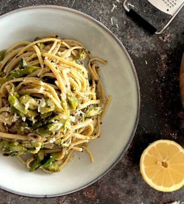 A bowl of plant-based and dairy-free vegan asparagus and pesto linguine