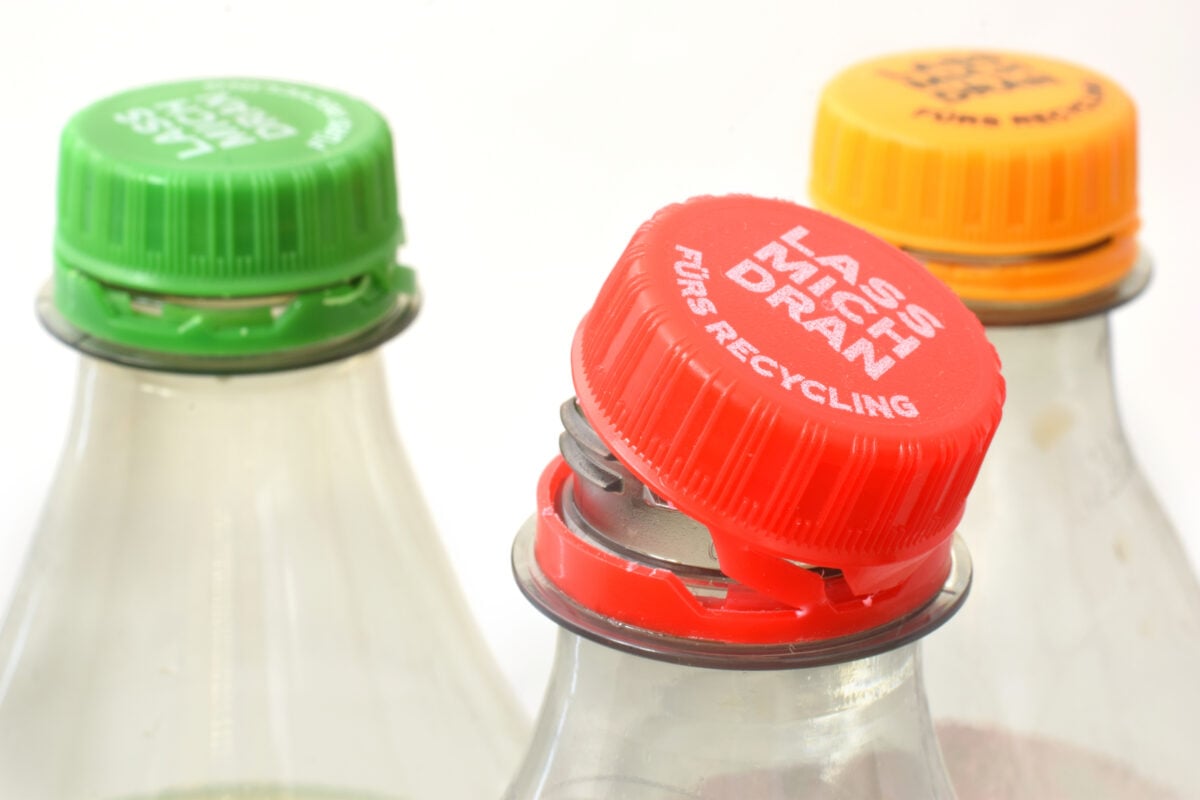 Bottles with red, green, and yellow bottle caps
