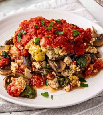 A plate of gluten-free aubergine lasagna