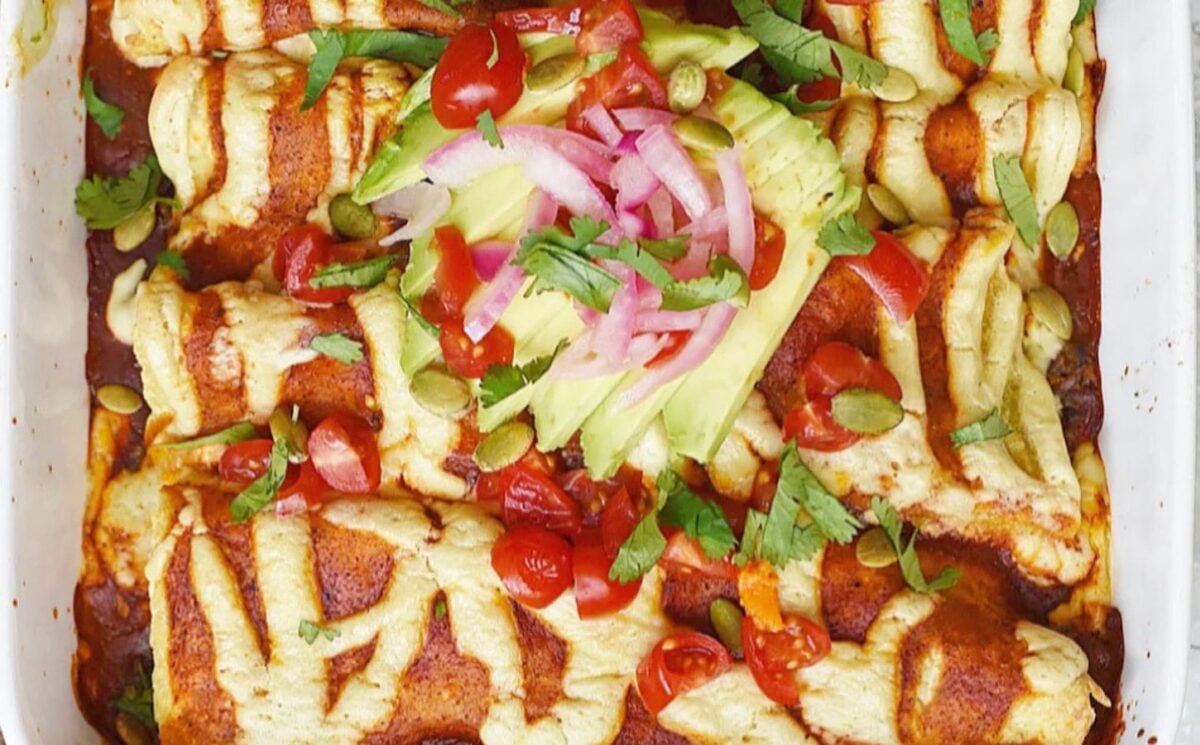 Photo shows a tray of vegan enchiladas