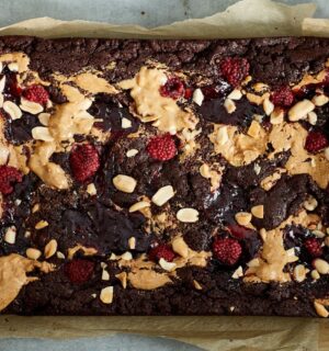 vegan chocolate brownies loaded with peanut butter and raspberry jam