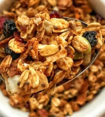 no oil granola made with all vegan ingredients, coconut, flax, chia seeds, cranberries, dates, and mixed nuts