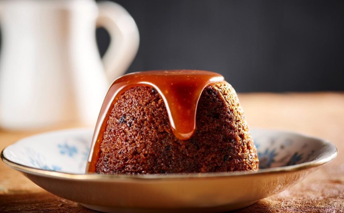 vegan sticky toffee pudding made with all plant-based ingredients and a vegan toffee sauce