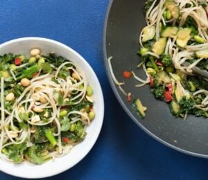 superfood stir fry packed with edamame, kale, ginger, lemongrass, chili, and garlic