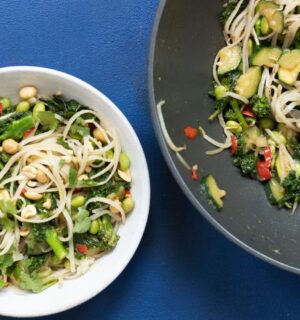 superfood stir fry packed with edamame, kale, ginger, lemongrass, chili, and garlic