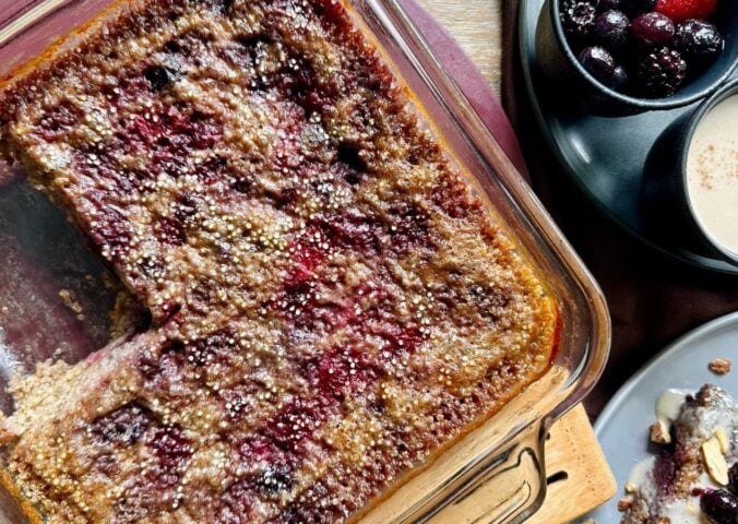 vegan quinoa sweet-berry bake made with chia seeds, blueberries, raspberries, blackberries, vanilla, maple syrup, and coconut milk and cream