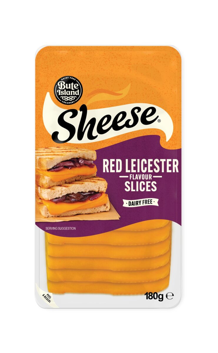 A packet of Red Leicester style vegan cheese from Sheese, with a rebranded orange packaging