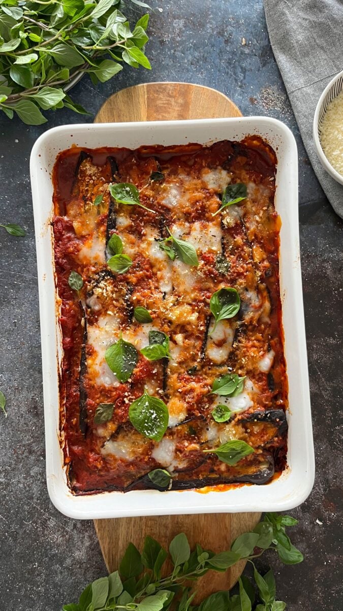 A tray of vegan parmigiana made with harissa and dairy-free cheese