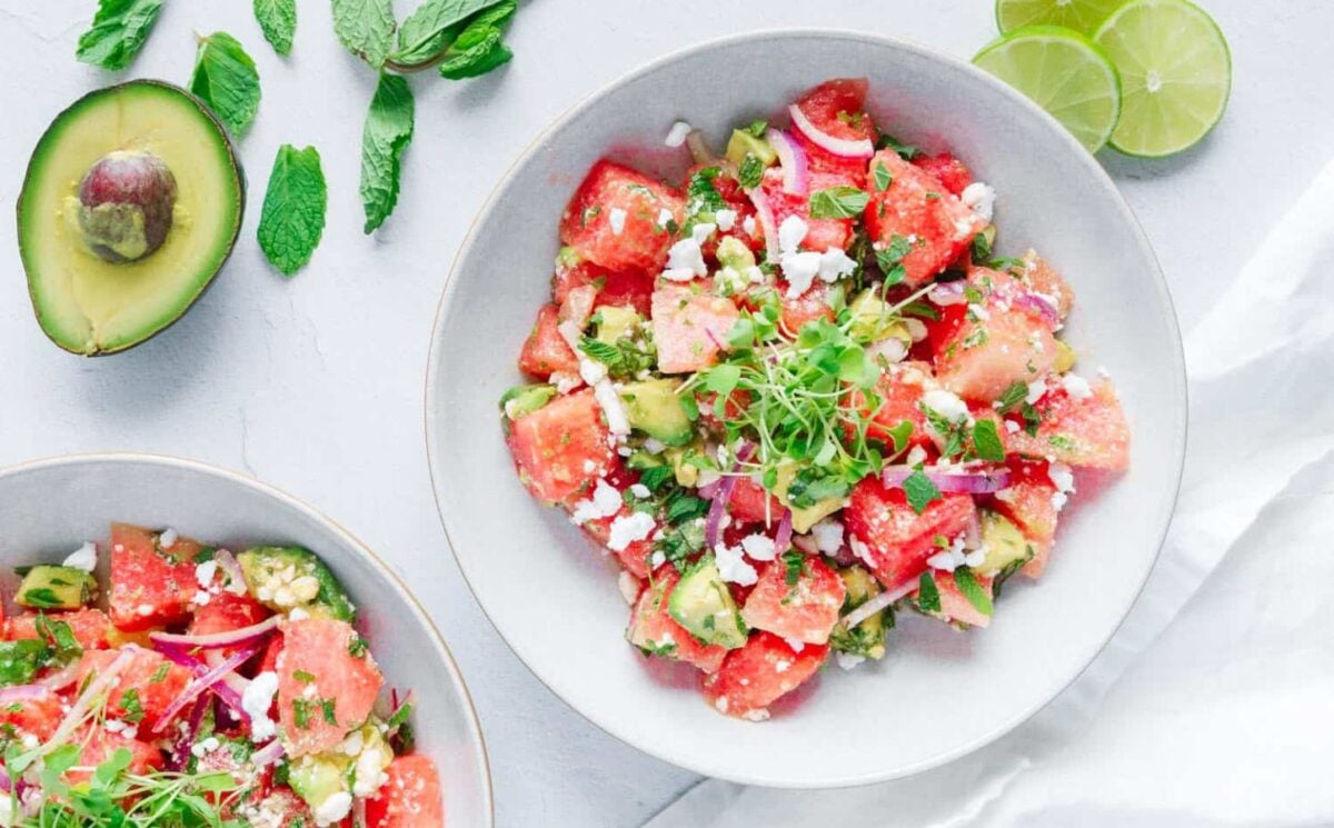 A vegan watermelon salad with mint, avocado, and dairy-free feta cheese