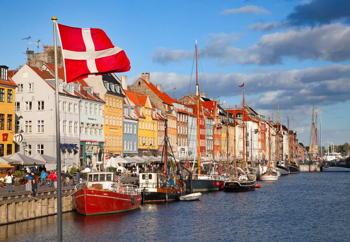 A shot of Copenhagen, Denmark, with the Danish flag flying