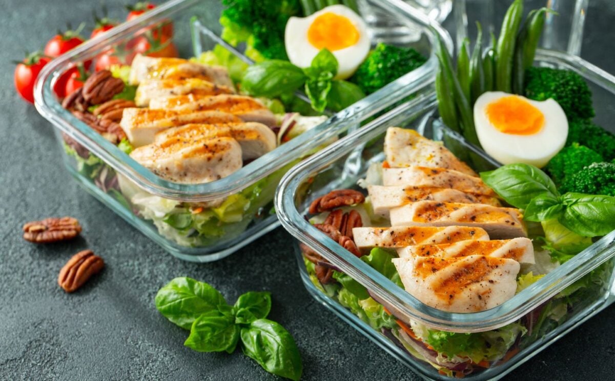 Tupperware boxes full of keto-friendly good, including eggs and chicken