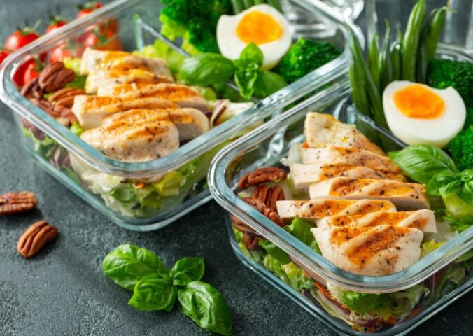 Tupperware boxes full of keto-friendly good, including eggs and chicken