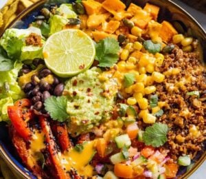 Photo shows a large vegan burrito bowl made using walnut-based "mince" as the main protein