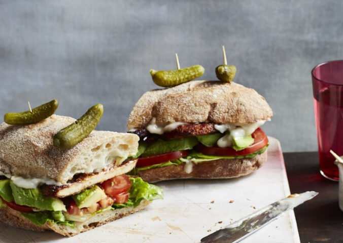 vegan BLT sharing size on ciabatta with avocado, tomato, lettuce, ketchup, tofu bacon, and mayo