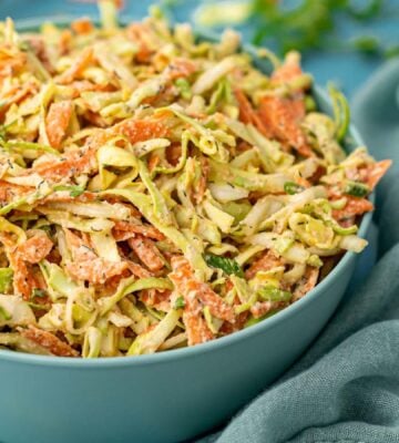 A bowl full of vegan and oil-free coleslaw