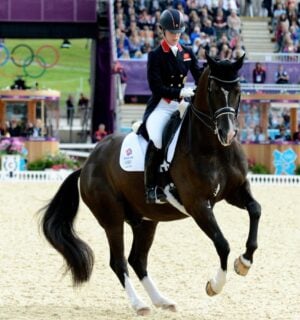 Dressage Olympian Charlotte Dujardin on a horse at the Olympics