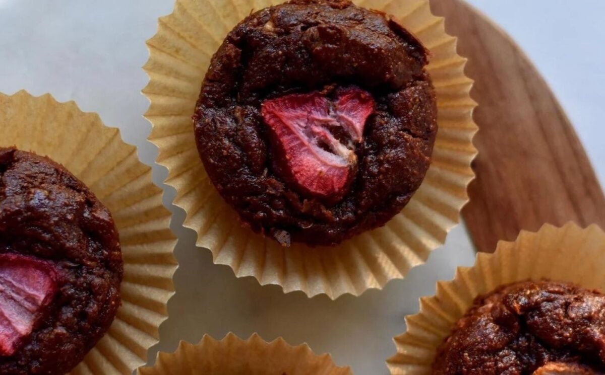 a batch of gluten-free vegan chocolate covered strawberry muffins 