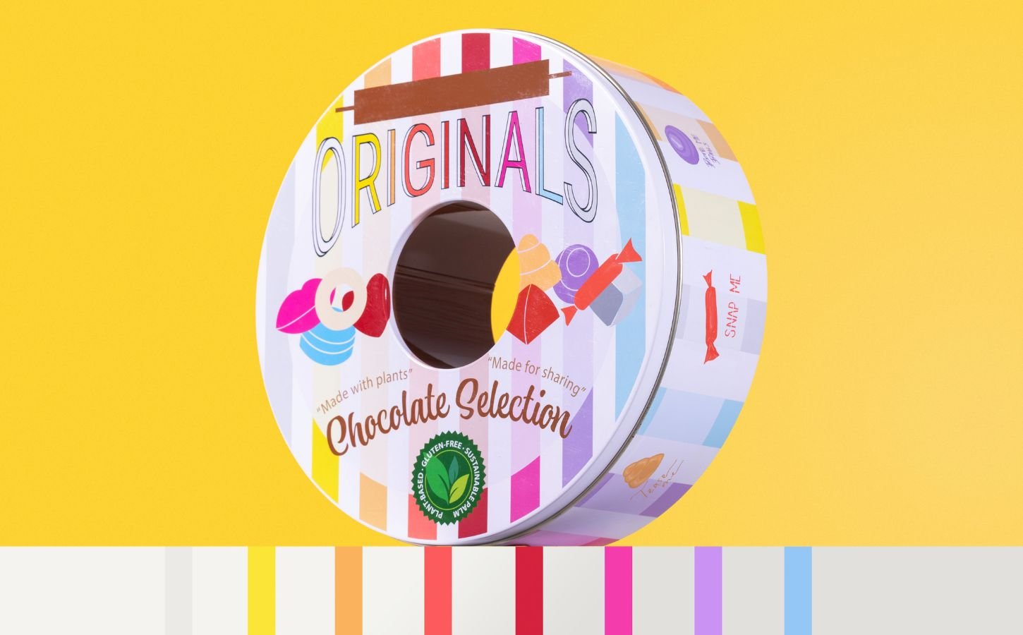 A dairy-free vegan chocolate selection tin named "Catherine Originals"
