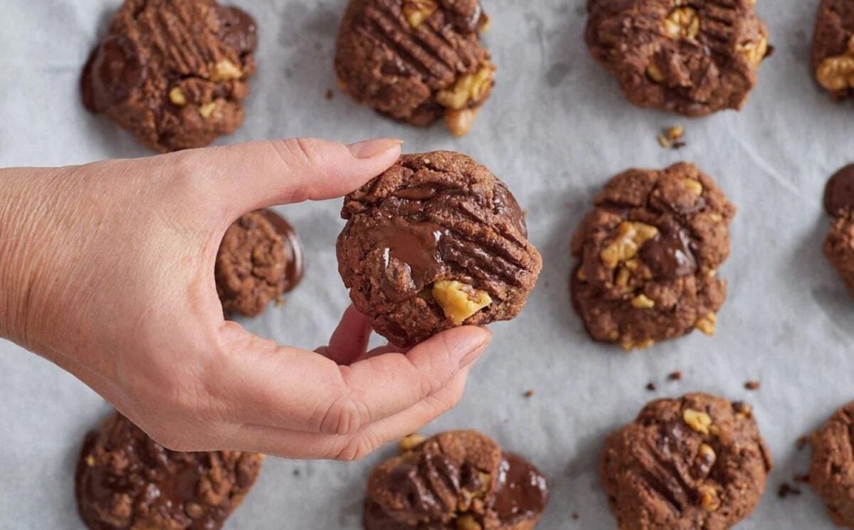 a batch of vegan chocolate and walnut cookies made with almond flour and apple sauce