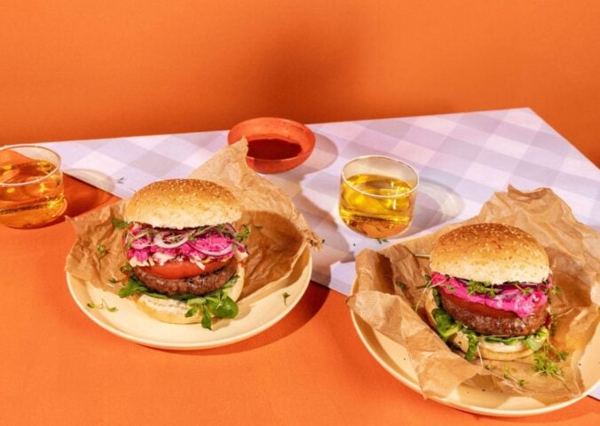 Photo shows two plant-based burgers made using Revyve's egg replacer
