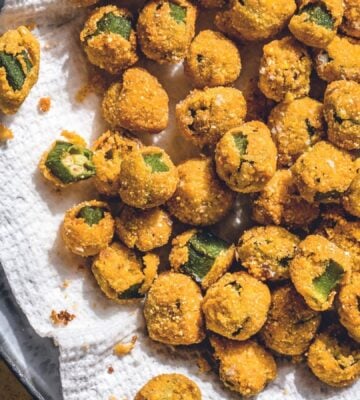 a picture of small pieces of fried okra with a vegan crumb