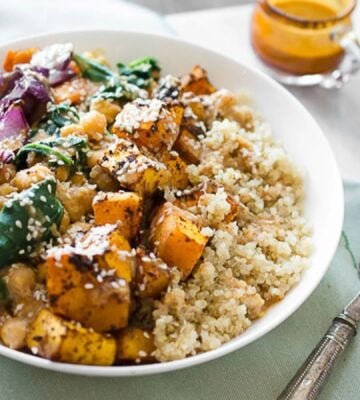 Photo shows a roasted squash and quinoa buddha bowl recipe by Ashley Madden of Rise Shine Cook