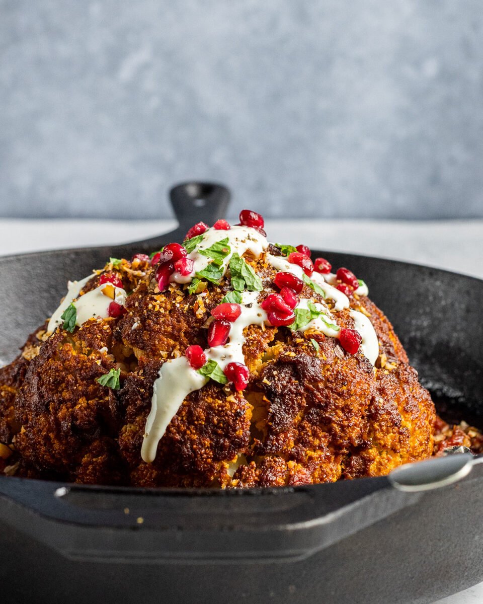 A vegan whole roasted cauliflower