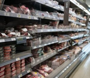 A supermarket shelf filled with meat