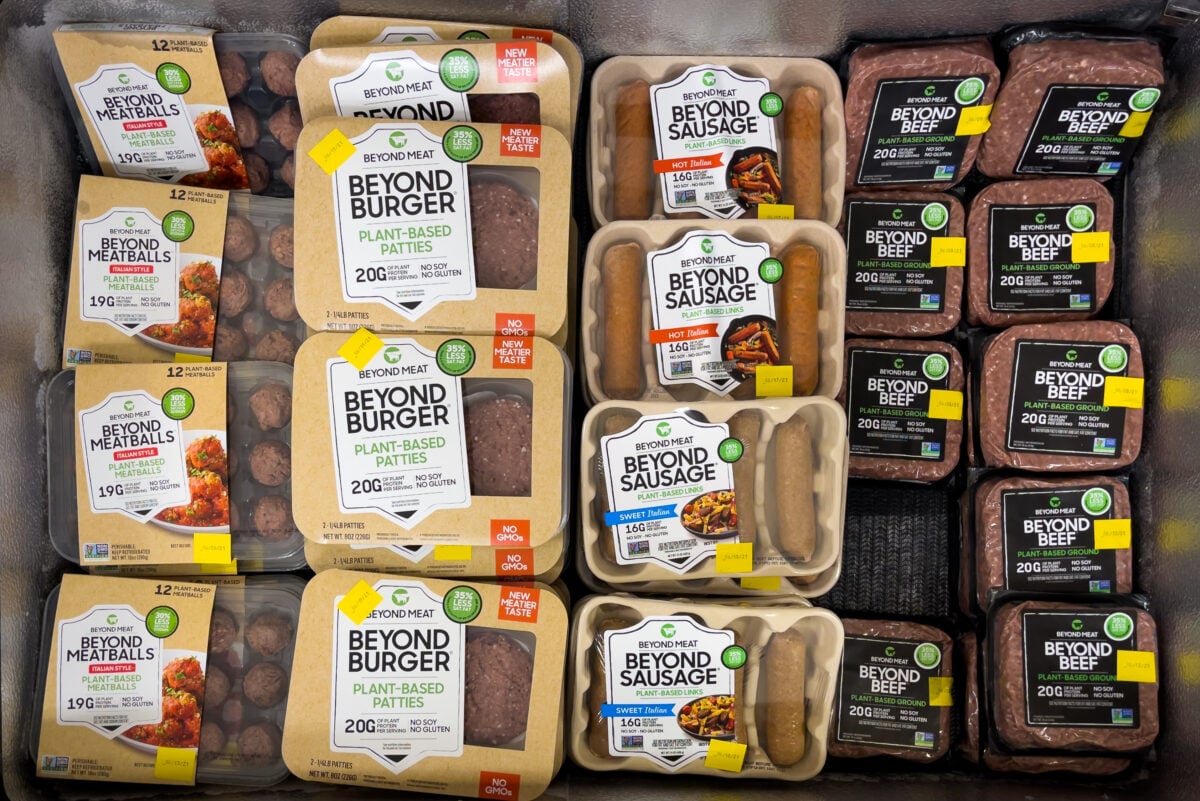 Photo shows a deep refrigerator full of Beyond Meat's plant-based alternative protein products