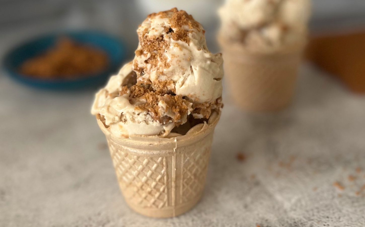 A cone full of vegan and dairy-free Biscoff ice cream