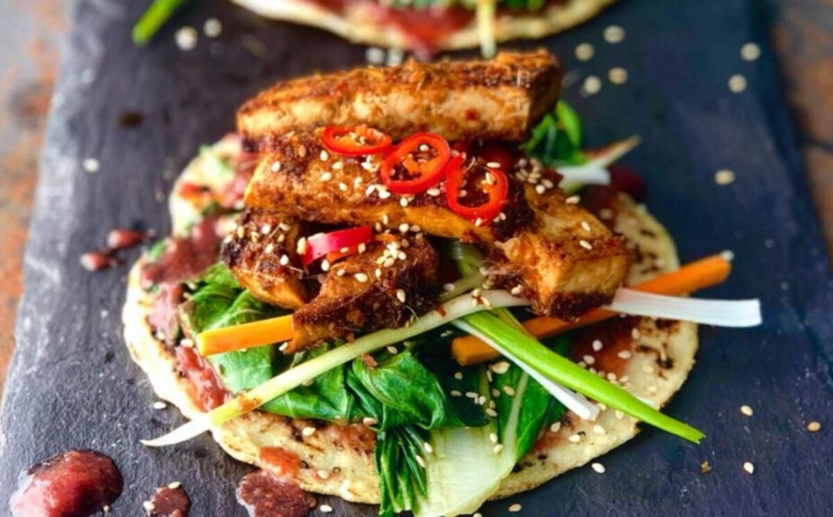 a picture of crispy teriyaki tofu with Chinese pancake made with typical Asian flavors and added veggies