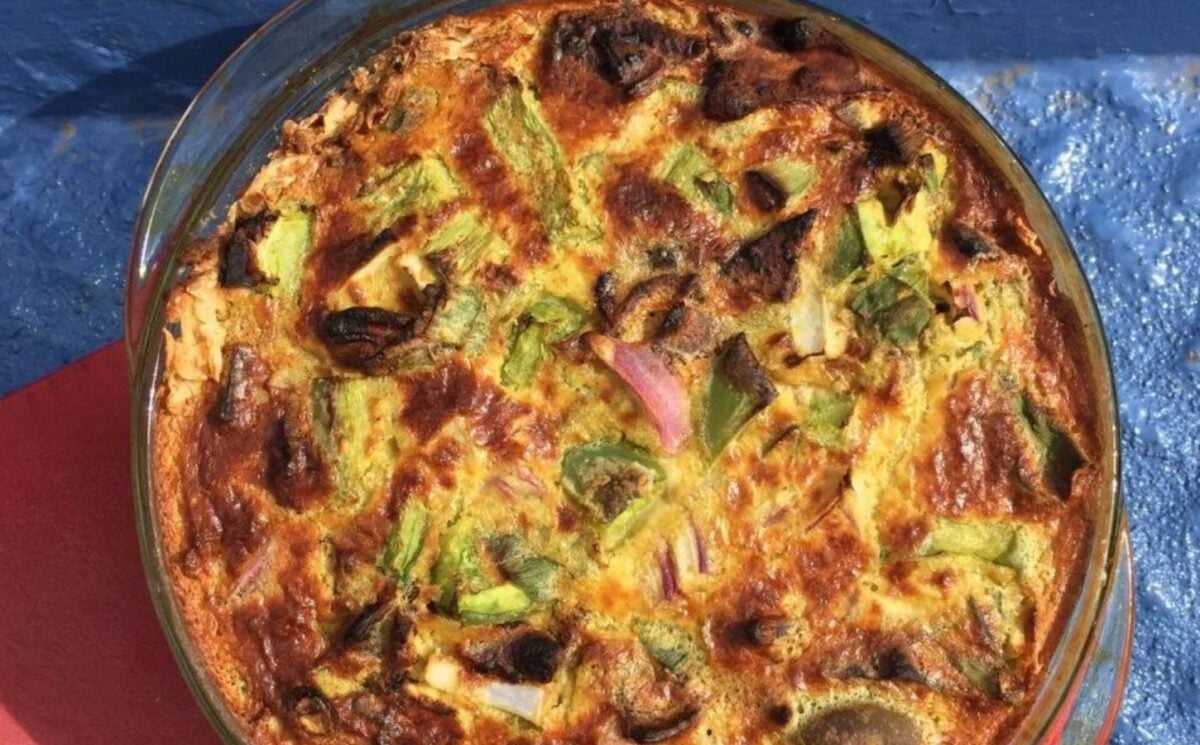 a picture of a vegan quiche for breakfast, made with chickpea flour, nutritional yeast, and veggies