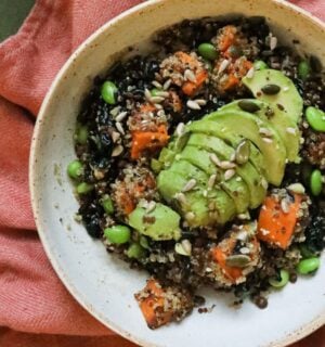 a picture of an energizing post-gym workout salad made with sweet potato, edamame, lentils, orange, and avocado