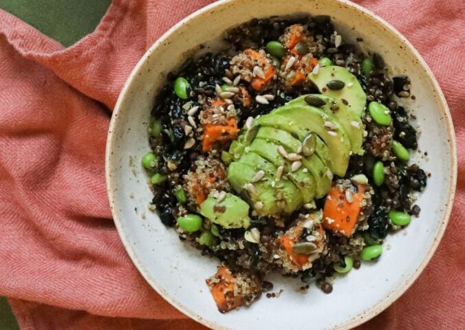 a picture of an energizing post-gym workout salad made with sweet potato, edamame, lentils, orange, and avocado