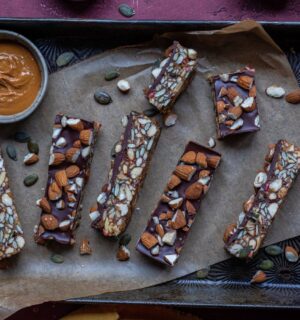 a picture of vegan energy bars made with apple, dates, nuts, seeds, and chocolate