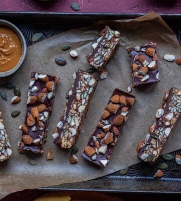 a picture of vegan energy bars made with apple, dates, nuts, seeds, and chocolate