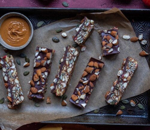 a picture of vegan energy bars made with apple, dates, nuts, seeds, and chocolate