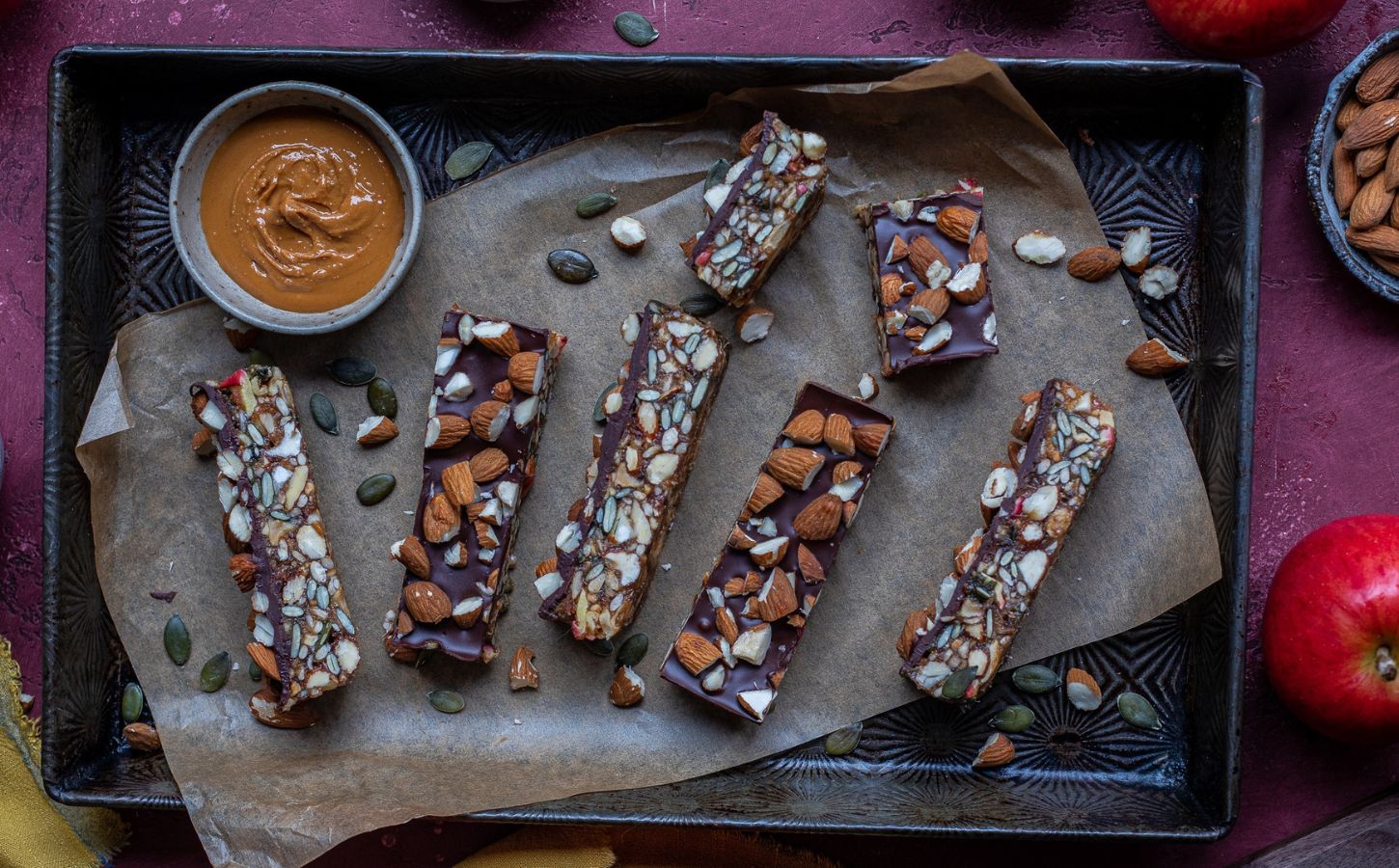 a picture of vegan energy bars made with apple, dates, nuts, seeds, and chocolate